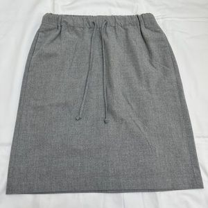 Aritzia high waisted drawstring skirt in size small in gray